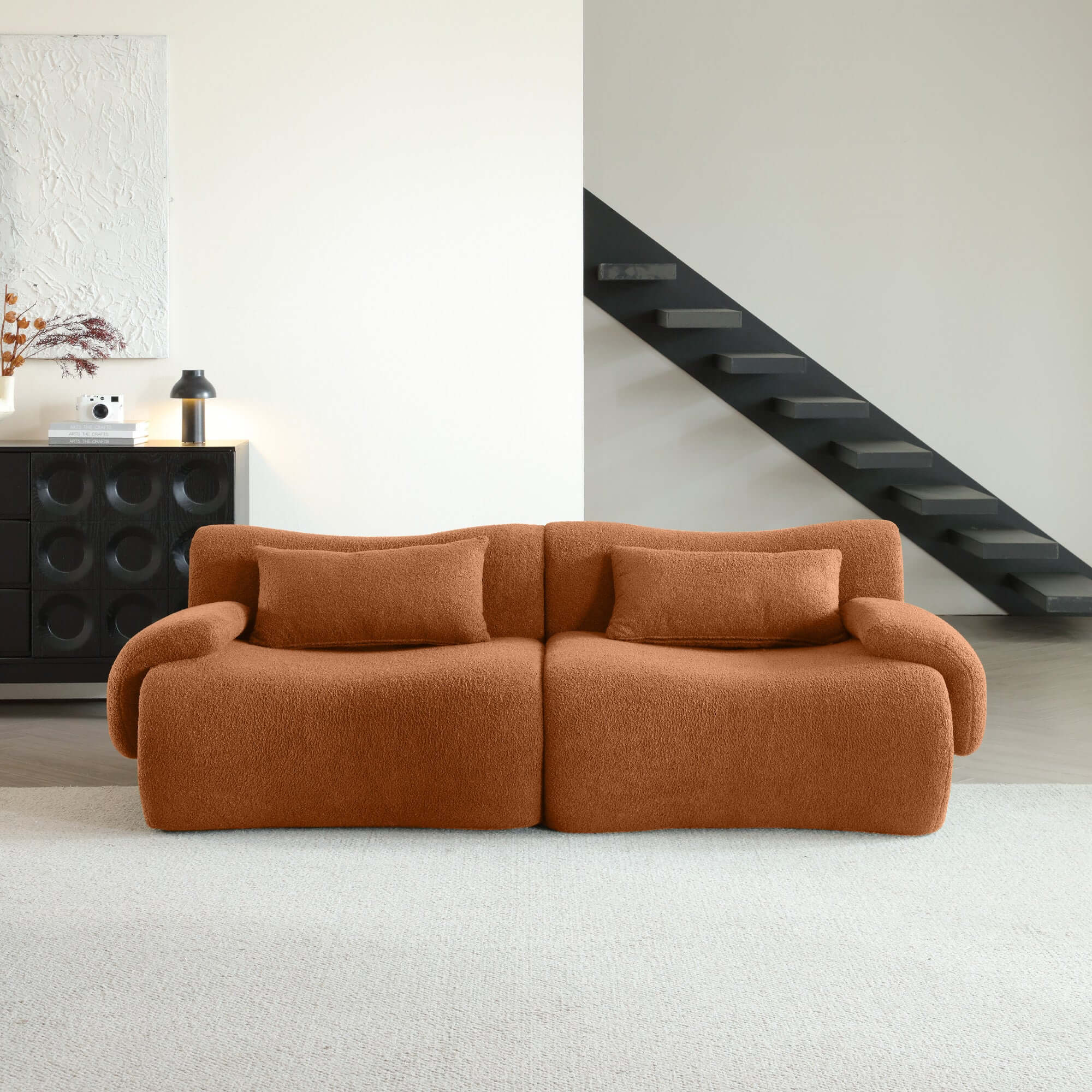 Modern sectional sofa upholstered in soft teddy velvet fabric with modular design