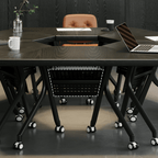 Black folding conference table with 360-degree casters for flexible workspace setups