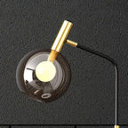 Elegant Black and Gold Glass Tray Table Lamp with Amber Shade