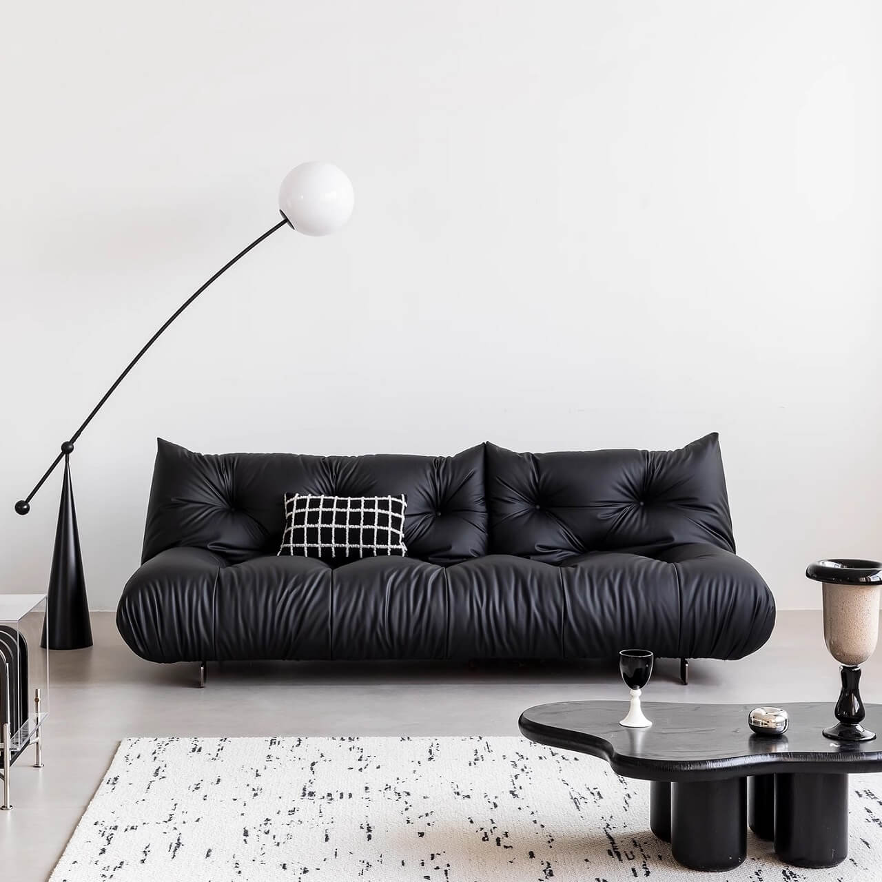 Elegant black microfiber leather sofa bed in minimalist style メイン画像