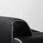 Black microfiber leather sofa with minimalist design, seats up to 3 people