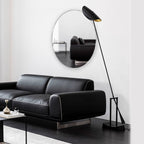 Black microfiber leather sofa with minimalist design, seats up to 3 people