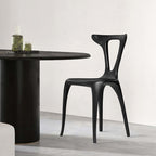 Elegant Deep Brown Solid Wood Lounge Chair with Unique Backrest