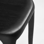 Elegant Deep Brown Solid Wood Lounge Chair with Unique Backrest