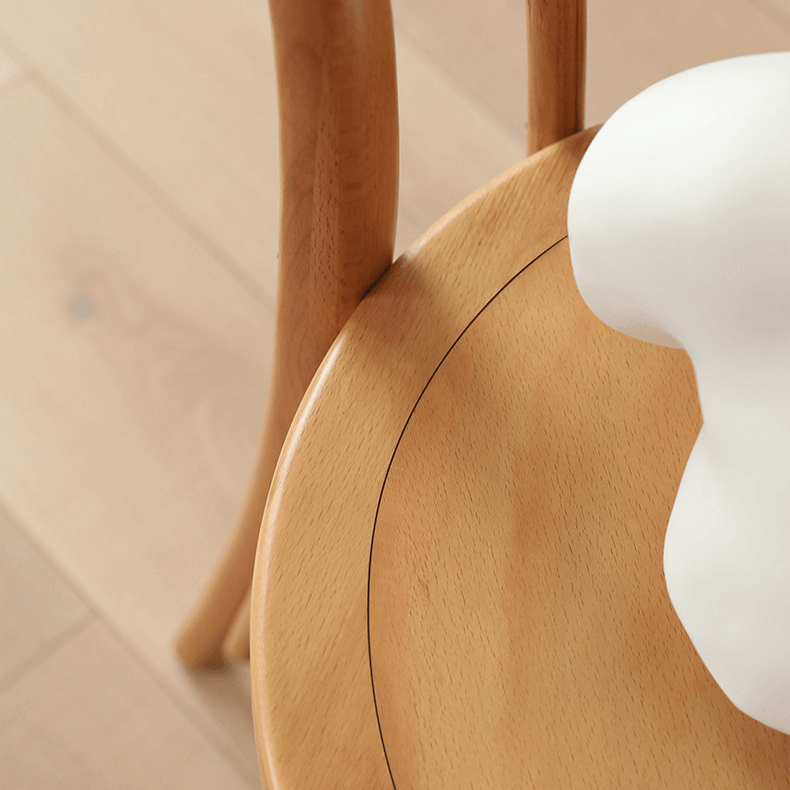 Ergonomic Bentwood Dining Chair with Sculptural Frame and Smooth Finish