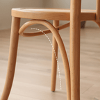 Ergonomic Bentwood Dining Chair with Sculptural Frame and Smooth Finish