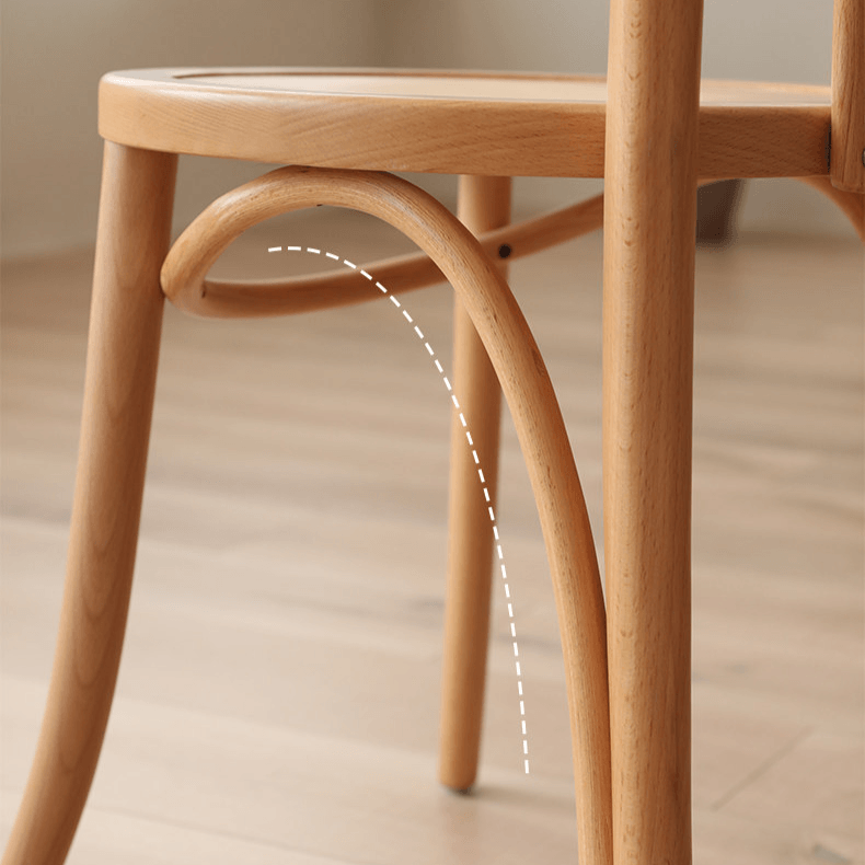 Ergonomic Bentwood Dining Chair with Sculptural Frame and Smooth Finish