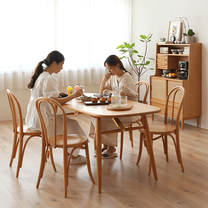Ergonomic Bentwood Dining Chair with Sculptural Frame and Smooth Finish