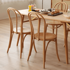 Ergonomic Bentwood Dining Chair with Sculptural Frame and Smooth Finish
