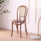 Ergonomic Bentwood Dining Chair with Sculptural Frame and Smooth Finish