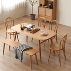 Ergonomic Bentwood Dining Chair with Sculptural Frame and Smooth Finish