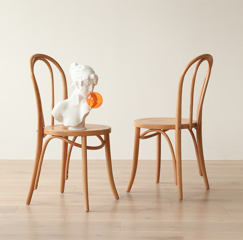 Ergonomic Bentwood Dining Chair with Sculptural Frame and Smooth