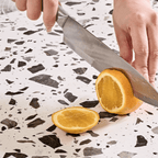 Round terrazzo coffee table with elegant design, perfect for adding sophistication to your living room