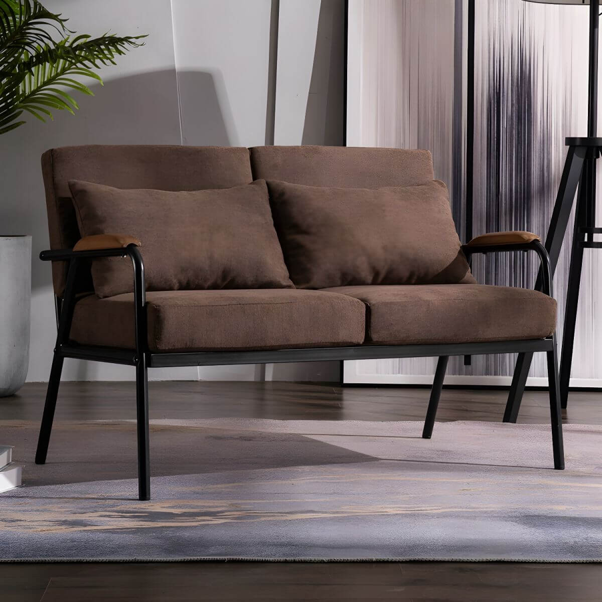 Mid century modern 2-seater sofa with black metal frame and solid wood arms