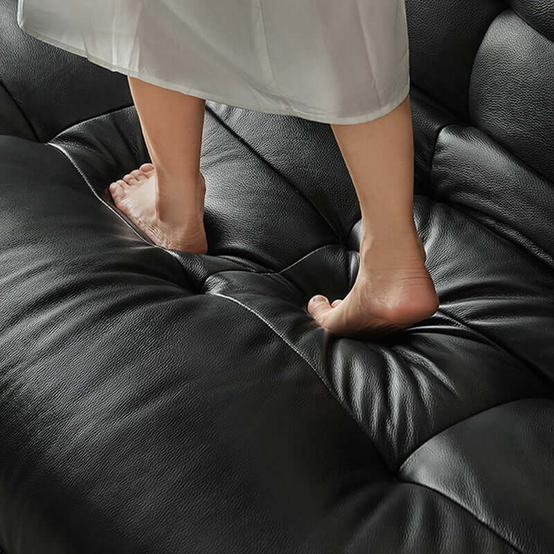 Togo style leather sleeper sofa bed without arms, perfect for compact living spaces