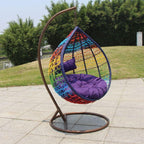 Metal porch swing with stand, cushions, and chain for comfortable outdoor seating