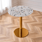 Modern marble table with sturdy metal base, perfect for adding a timeless aesthetic to any space