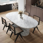 Modern oval marble dining table with white double pedestal base for stylish dining rooms