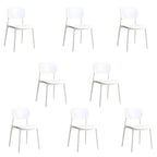 Stackable Scandinavian style plastic and acrylic side chair with low back for dining