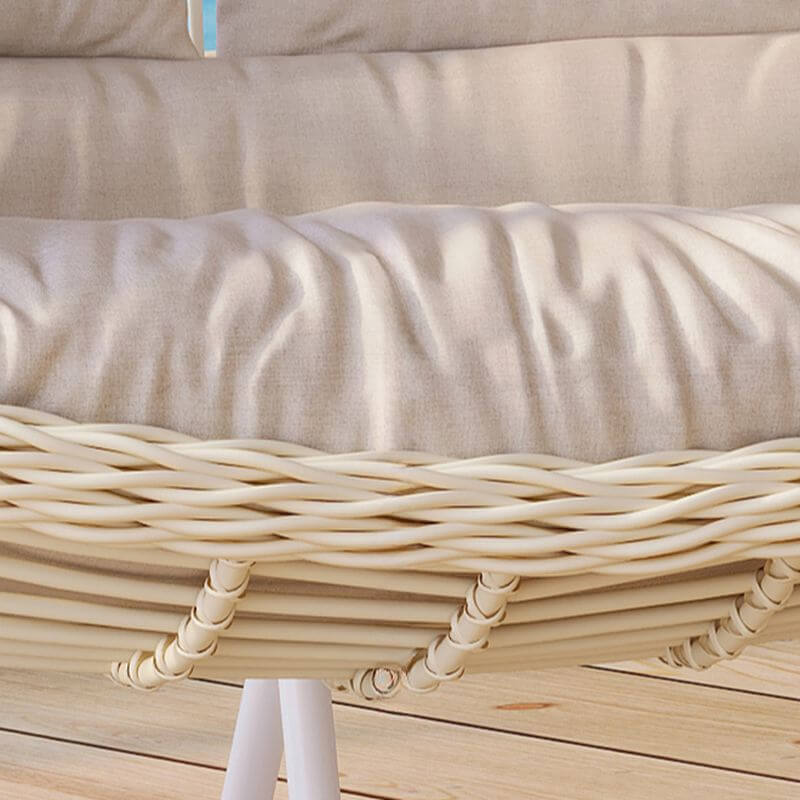 Pink metal 2-seater porch swing with stand, chain, and cushions for outdoor seating