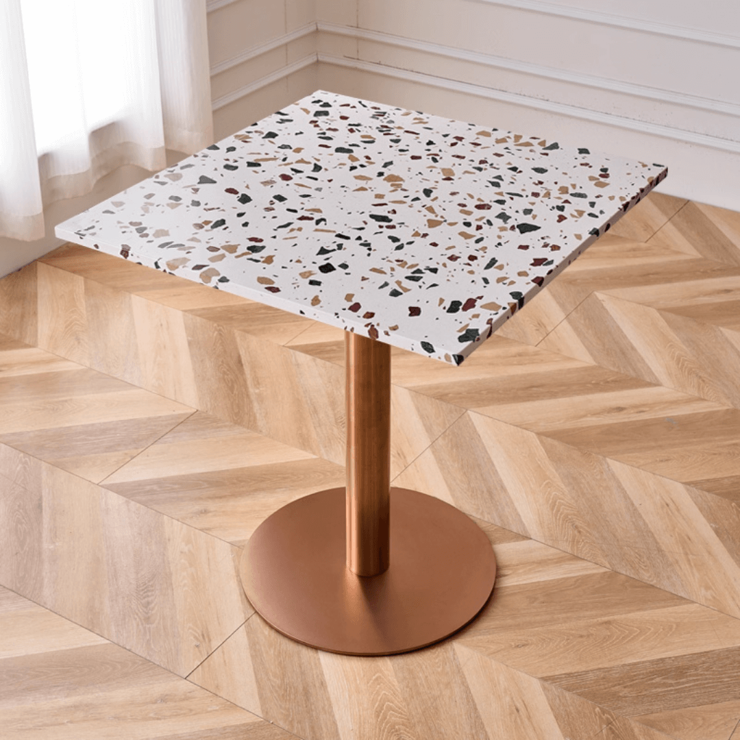 Modern marble table with sturdy metal base, perfect for adding a timeless aesthetic to any space