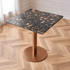 Modern marble table with sturdy metal base, perfect for adding a timeless aesthetic to any space
