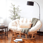 Cozy natural rattan papasan chair available in single or double size for comfortable lounging