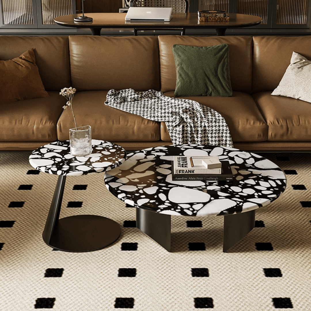 Round terrazzo coffee table set with black and white pattern, perfect for modern living rooms