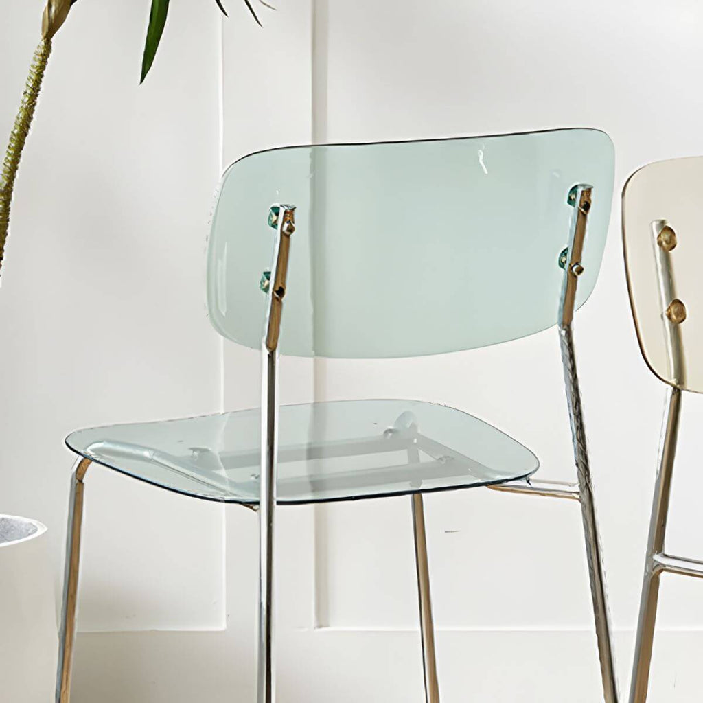 Transparent acrylic dining chair with modern design, perfect for living room and kitchen seating