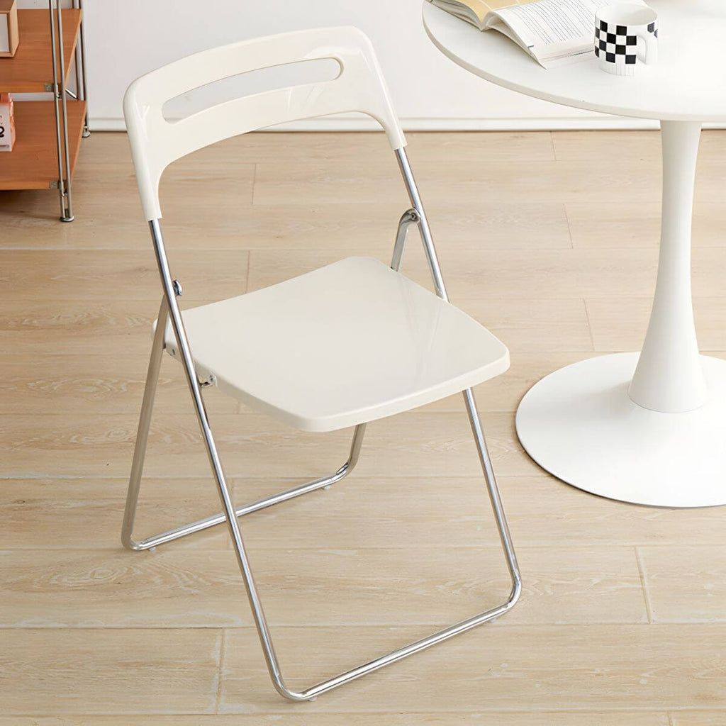Modern collapsible open back side chair made of plastic and acrylic, ideal for kitchen and dining areas