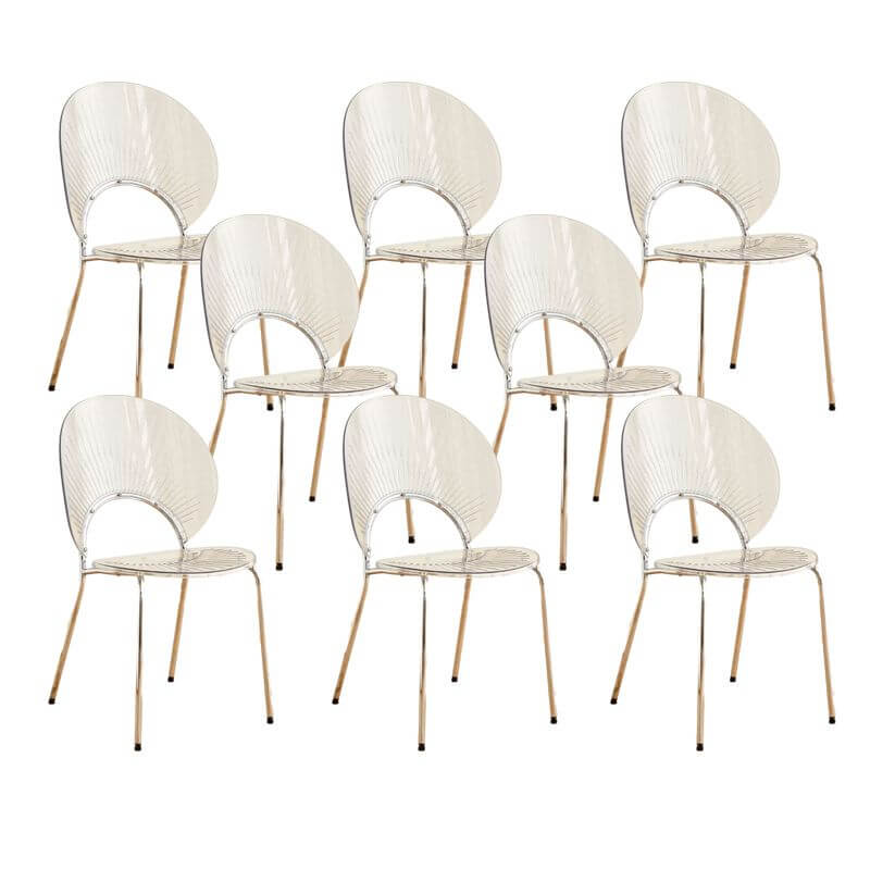 Stackable Scandinavian style dining chair with plastic seat, acrylic back, and silver legs