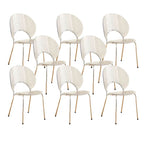 Stackable Scandinavian style dining chair with plastic seat, acrylic back, and silver legs