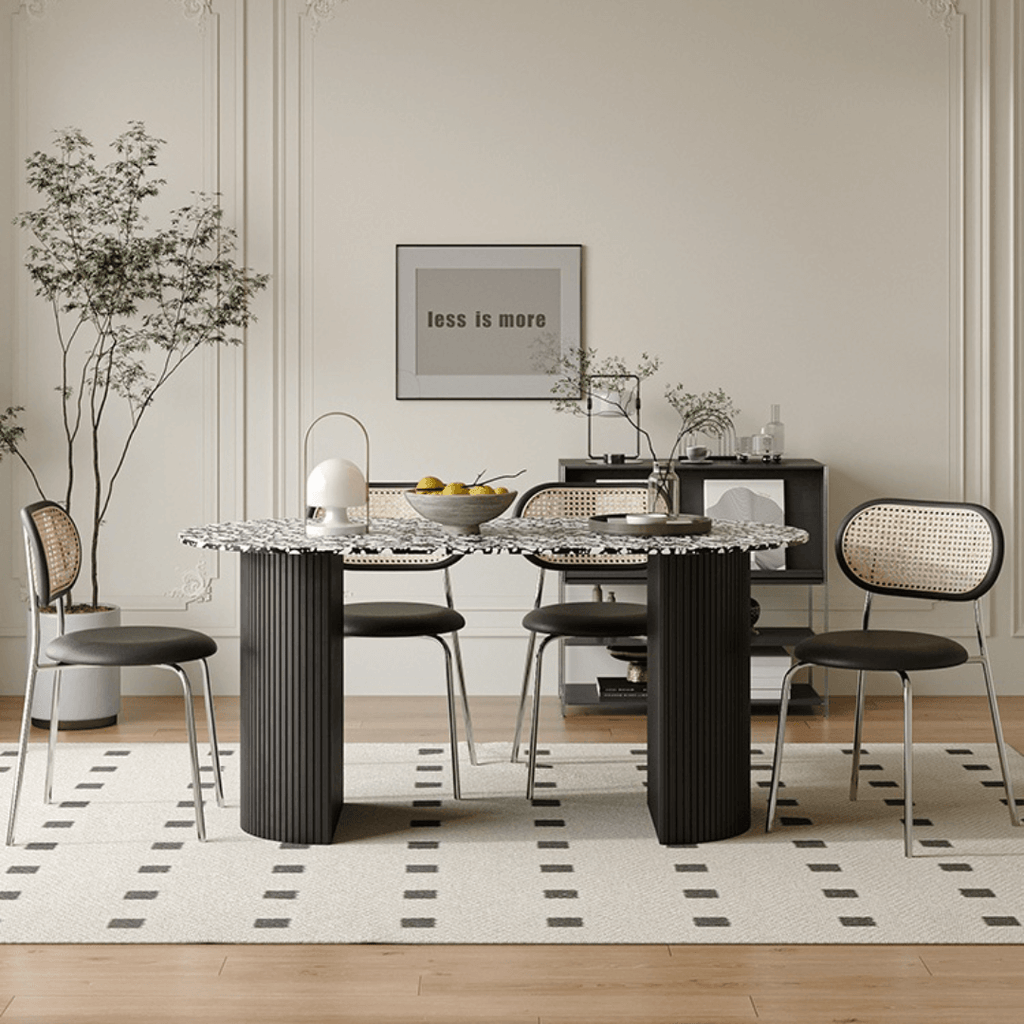 Modern black and white terrazzo dining table with sleek vintage design
