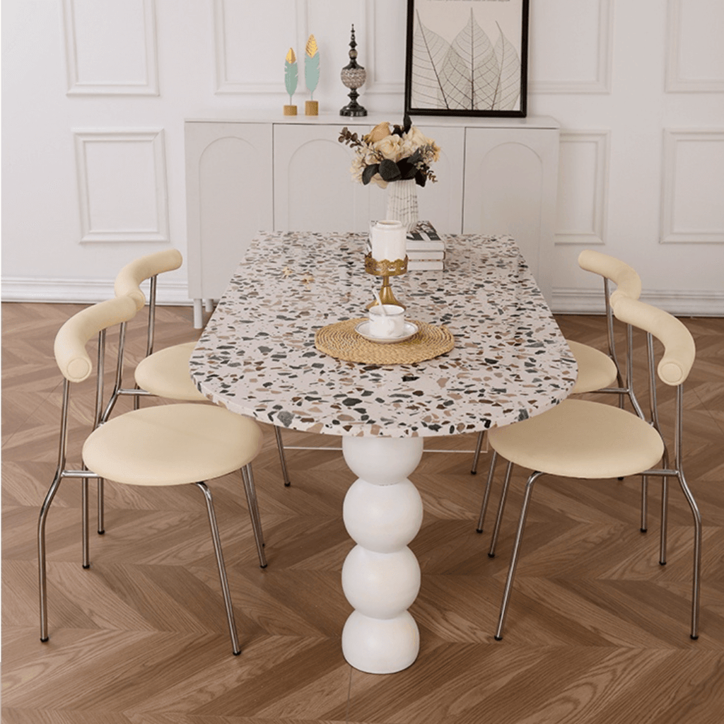 Half-elliptical terrazzo dining table with multicolor mosaic design, durable and stylish