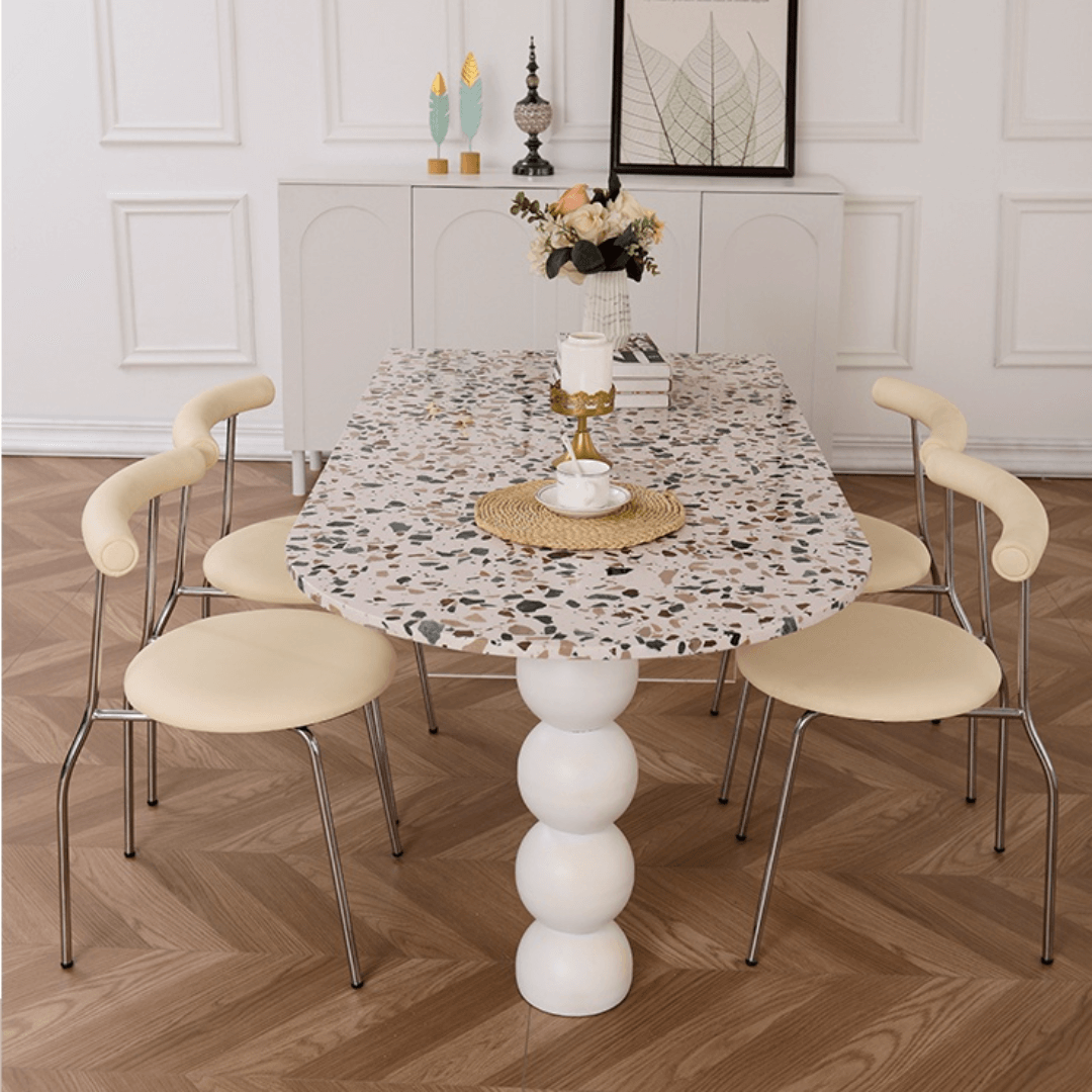 Half-elliptical terrazzo dining table with multicolor mosaic design, durable and stylish