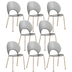 Stackable acrylic dining chair with open back and metal legs, armless design for modern dining rooms