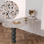 Half-elliptical terrazzo dining table with multicolor mosaic design, durable and stylish