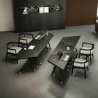 Black folding conference table with 360-degree casters for flexible workspace setups