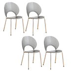 Stackable acrylic dining chair with open back and metal legs, armless design for modern dining rooms