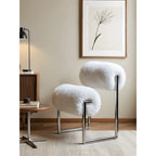 Fluffy White Accent Chair With Sculptural Bolster Form and Steel Frame