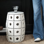 Glossy Geometric Drum Side Table with Pierced Detail, Sculptural Accent