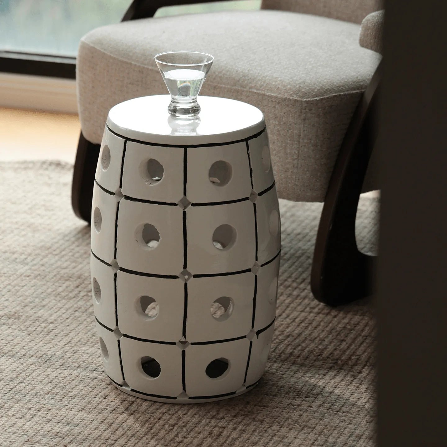 Glossy Geometric Drum Side Table with Pierced Detail, Sculptural Accent