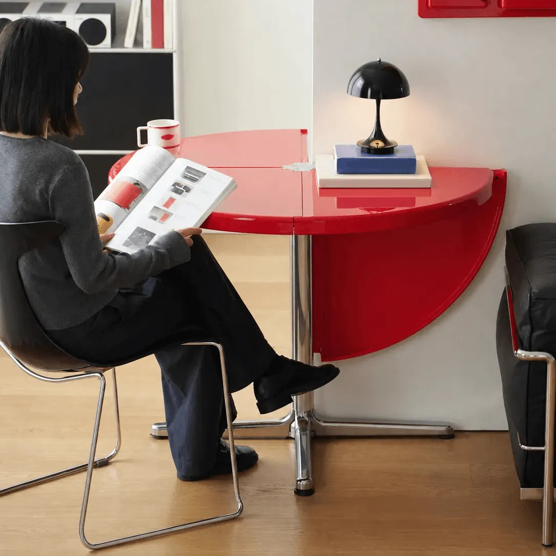 Glossy Red/Black/White/Blue Extendable Table With Hidden Casters and Sculptural Form Main Product Image