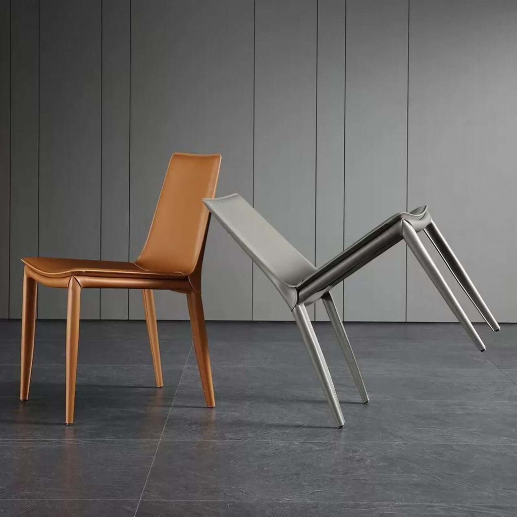 Single dining chair with gray saddle leather seat and carbon steel frame, minimalist luxury design main product image