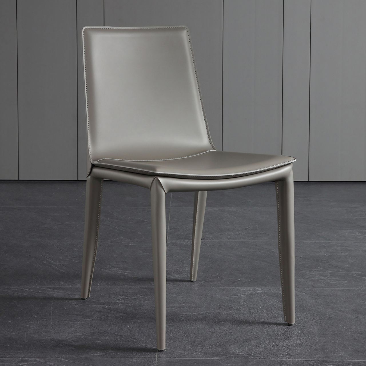Minimalist luxury gray saddle leather dining chair with carbon steel frame