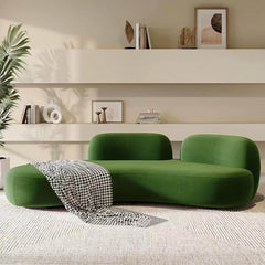 Elegant green matte velvet curved multi-seater lounge couch in a creative design