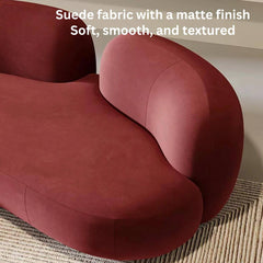 Stylish multi-seater velvet lounge couch with a unique curved shape