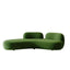 Curved green matte velvet sofa with creative shape, multi-seater lounge couch for modern living rooms