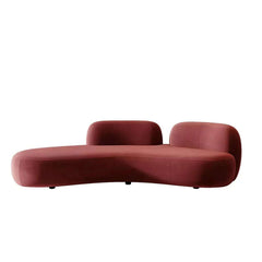 Stylish multi-seater velvet lounge couch with a unique curved shape