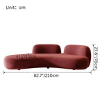 Curved green matte velvet sofa with creative shape, multi-seater lounge couch for modern living rooms dimensions